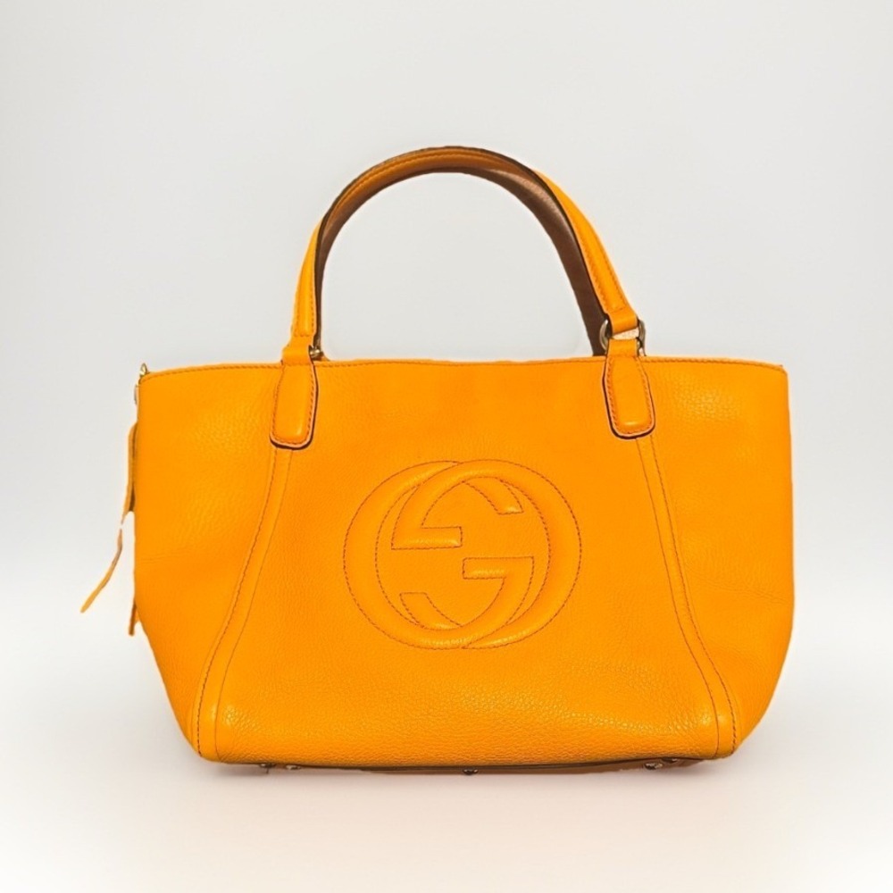 Gucci Soho Small Leather Tote Orange Pebbled Interlocking G Tassel Handbag